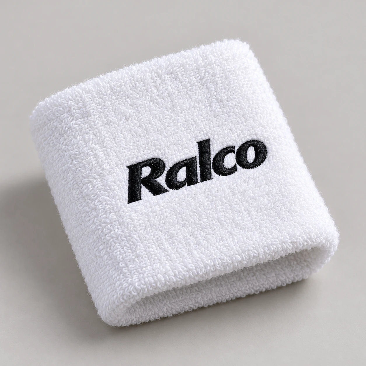 White embroidered Ralco wristband